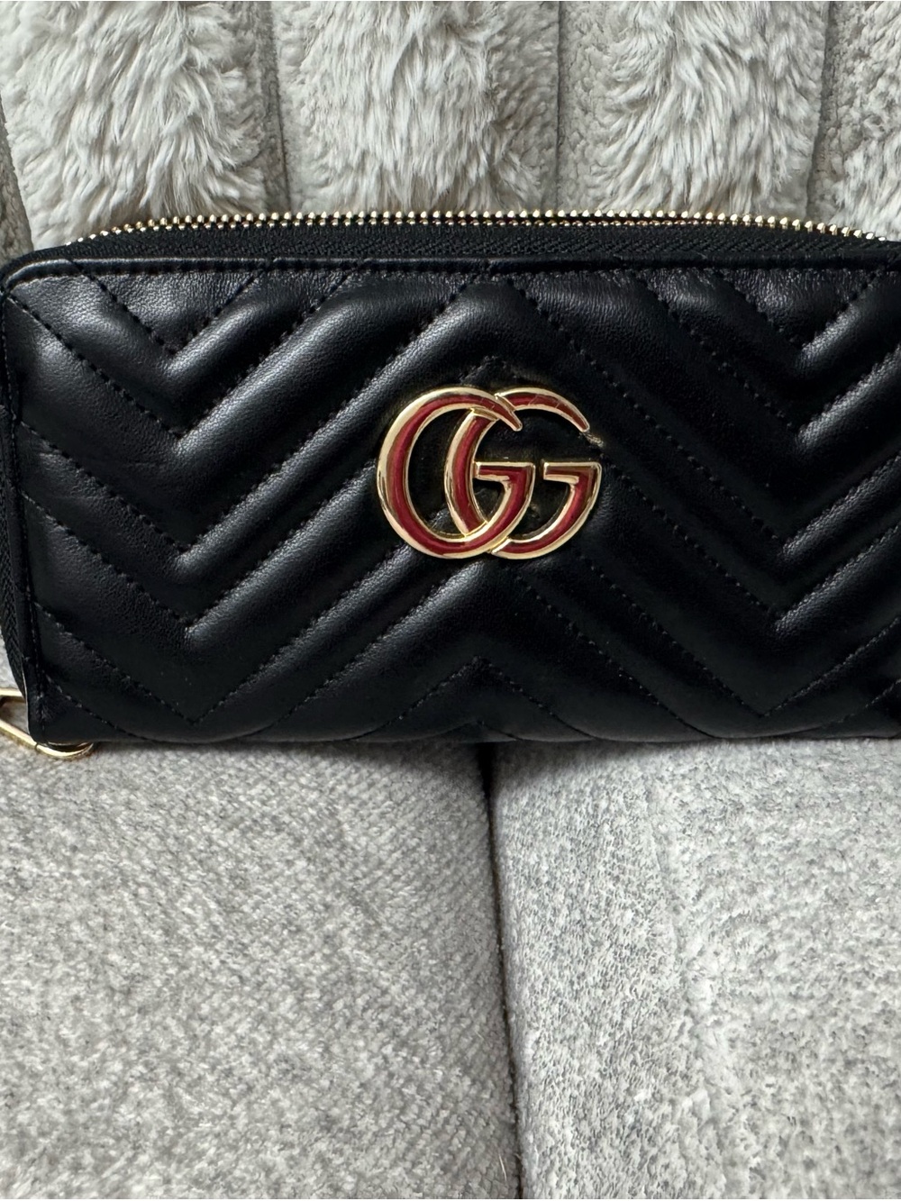 Black Quilted Zip-Around Wallet with Gold Logo